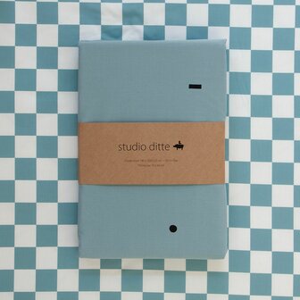 Studio Ditte hoeslaken blokjes steenblauw 140x200